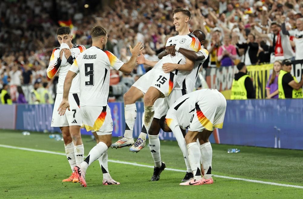 Em jogo com raios e chuva de granizo, Alemanha vence a Dinamarca e se classifica para as quartas de final da Eurocopa Em jogo com raios e chuva de granizo, Alemanha vence a Dinamarca e se classifica para as quartas de final da Eurocopa